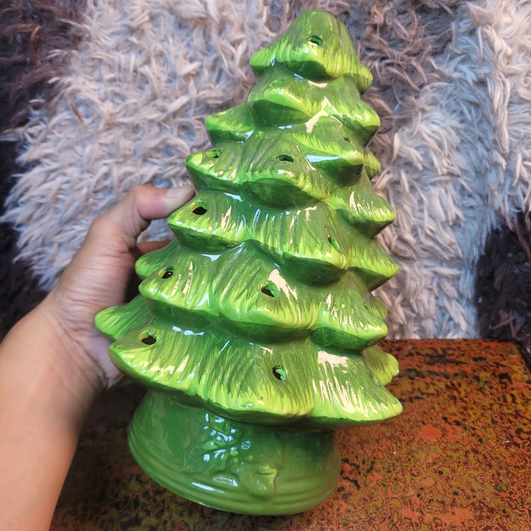 Around 1 kilo Classic Ceramic Christmas Tree Luminary Decor. (Category: Vintage Collectibles) located in Pasig City. Submitted by hoa_japan_surplus_32023 (Listing ID 1463223967, Image 3). Description: 10.5x7.5 inches, approx. 🗣Note: Minor surface paint loss in some areas, consistent with its vintage condition. ❌️NON-COD ✅️ PAYMENT FIRST POLICY ✅️ FIRST TO PAY _____________________________________________ ‼️SHIPPING OPTION‼️ 📌Flash Express, J&T,