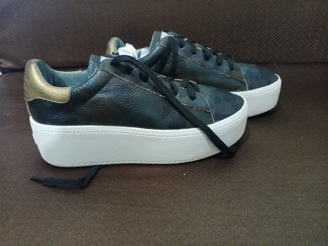 Ash Cult Camouflage Platform Sneakers SIZE 36 (Category: Shoe inserts) located in General Santos City (Dadiangas). Submitted by thrift.ta.bai (Listing ID 1463216869, Image 1). Description: Ash Cult Camouflage Platform Sneakers Faint blue jean dye stain (in the photos), and light friction wear and discolored lining (in the photos also) SIZE 36 7.5/10 👍🏻👍🏻.