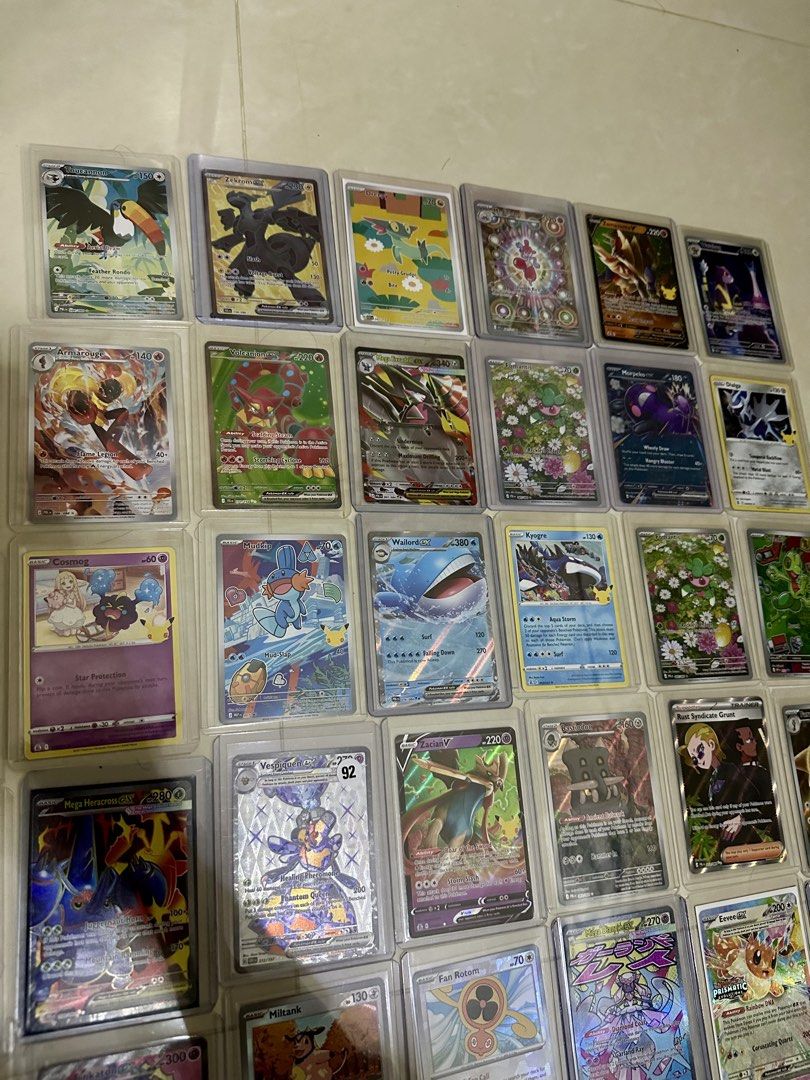 Assorted characters (Category: Raw Cards) located in Singapore. Submitted by chrono_watch_engineers (Listing ID 1463243244, Image 2). Description: Pokemon Cards English: selling all for $50. NOT SELLING AS SINGLES, ONLY AS A SET. Sir, full art, ex, mega ex..