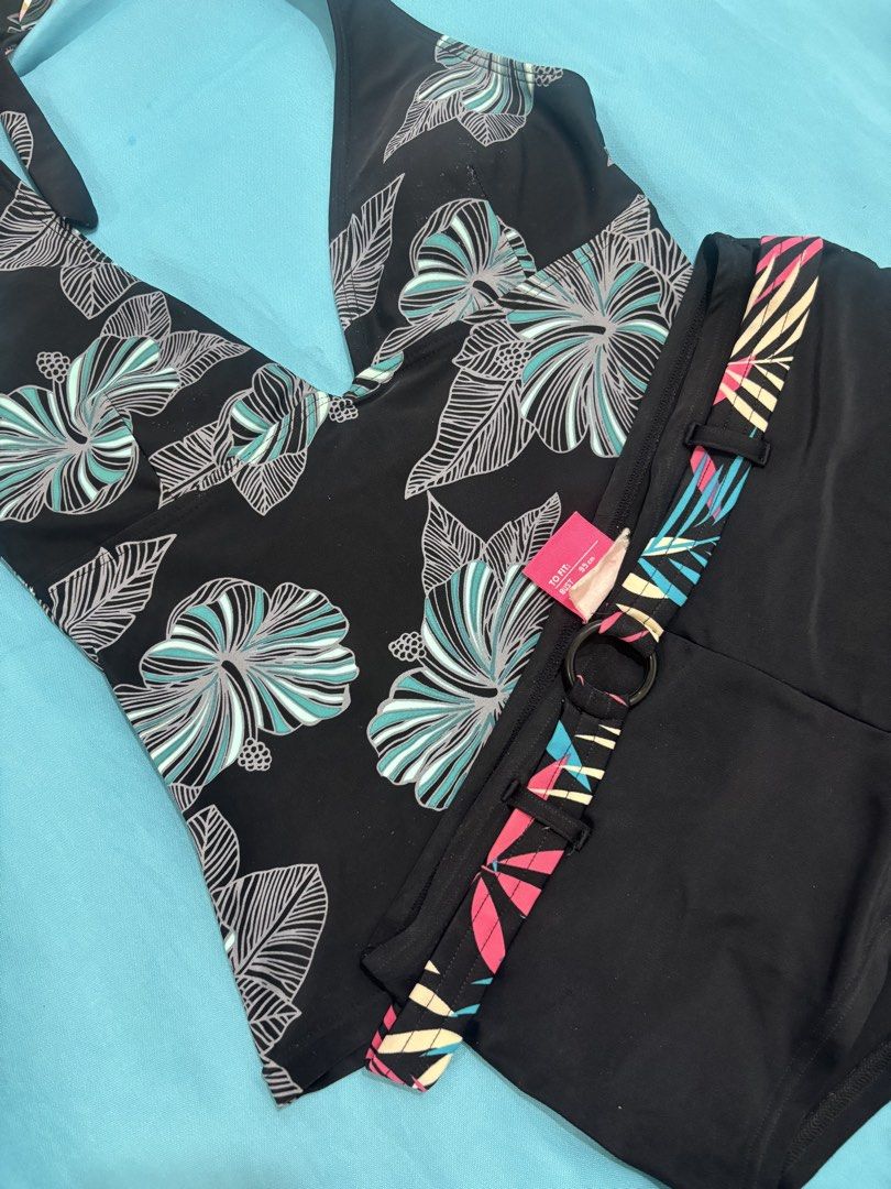 Assorted Swimwear - One Piece, Tankini Top, Bikini Top (Category: Bikinis & Swimsuits) located in Manila. Submitted by lemonmnmn (Listing ID 1463257839, Image 3). Description: - Bundle includes 4 swimwear pieces. - Dark brown one-piece with tie front and ruffled top. - Pink Adidas tankini top. - Black one-piece with tropical print and colorful trim. - Ideal for beach trips and pool days..