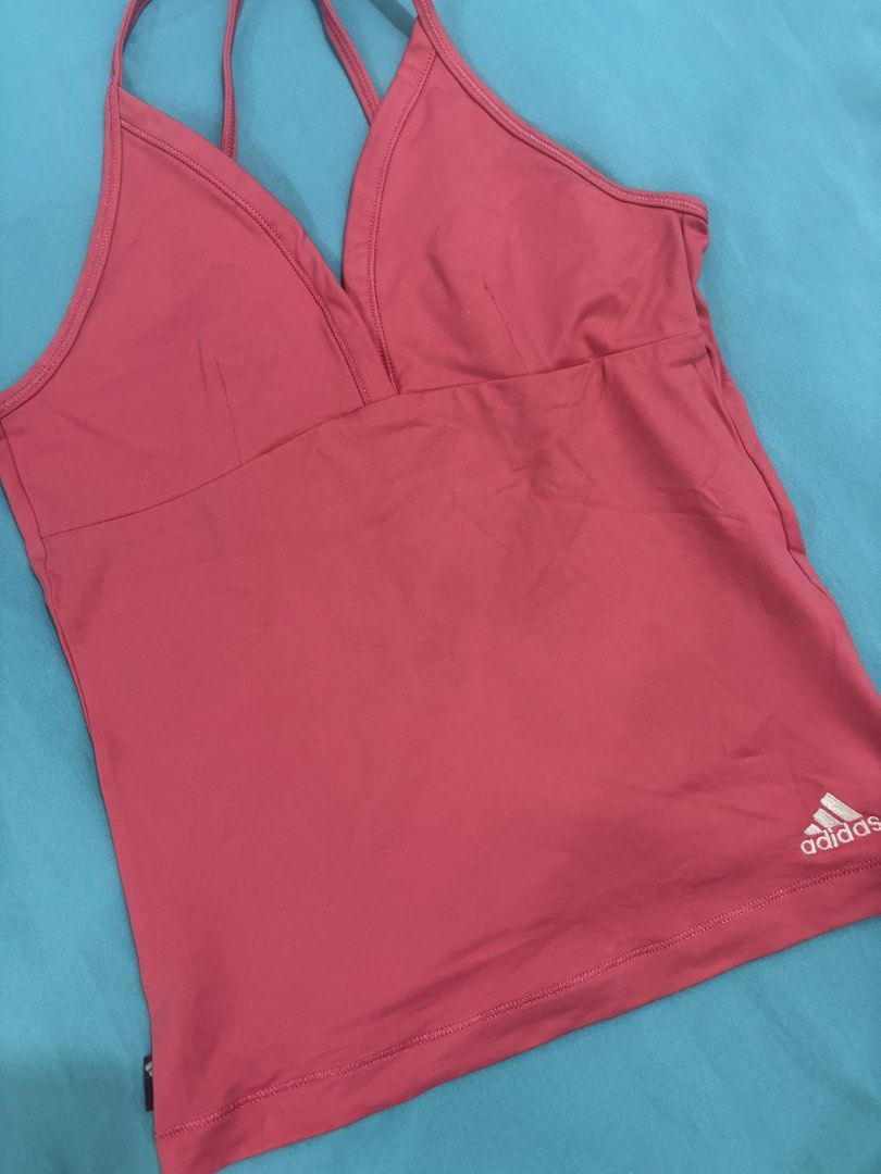 Assorted Swimwear - One Piece, Tankini Top, Bikini Top (Category: Bikinis & Swimsuits) located in Manila. Submitted by lemonmnmn (Listing ID 1463257839, Image 2). Description: - Bundle includes 4 swimwear pieces. - Dark brown one-piece with tie front and ruffled top. - Pink Adidas tankini top. - Black one-piece with tropical print and colorful trim. - Ideal for beach trips and pool days..
