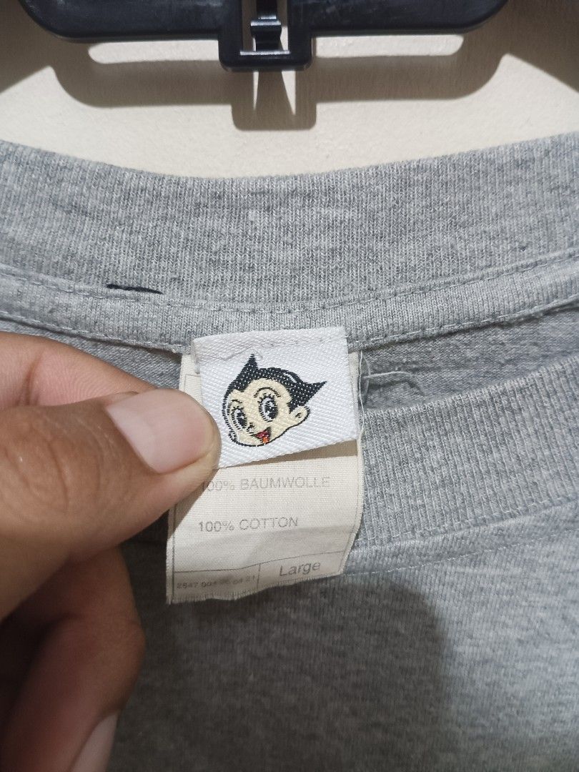 Astro Boy (Category: Activewear) located in Cebu City. Submitted by nooffense (Listing ID 1463226393, Image 3). Description: Vintage Astro Boy "Mighty Atom" Hologram Tee Astro Boy Early 20's OHT Size:XL(22.5x25.5) Issue:ALTER LINTS AND HAIRLINES Price:600+SF Pm for more details Cebu City 📍.