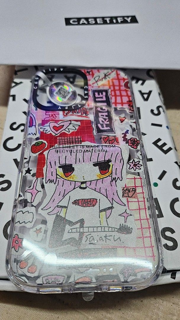 Authentic Casetify iPhone 17 (Category: Cases & Sleeves) located in Quezon City. Submitted by goldie32 (Listing ID 1463214765, Image 1). Description: Never used Casetify for iPhone 17. Pink Rock Collage design Impact Clear Case MagSafe compatible iPhone 17 Clear SRP 4290.