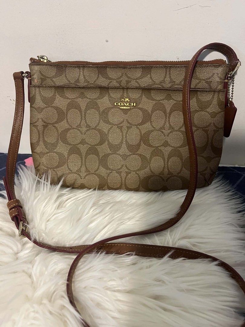 Authentic coach (Category: Cross-body Bags) located in Caloocan City. Submitted by trebdy01 (Listing ID 1463222784, Image 1). Description: .