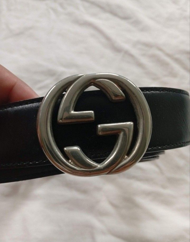 Authentic vintage Gucci Black Leather Belt with GG Buckle (Category: Belts) located in Iriga City. Submitted by sybelshop (Listing ID 1463158321, Image 1). Description: - Authentic Gucci Belt - Color: Black Leather - Iconic GG Buckle - Size: 75 - Made in Italy - Great statement piece - Selling as is.