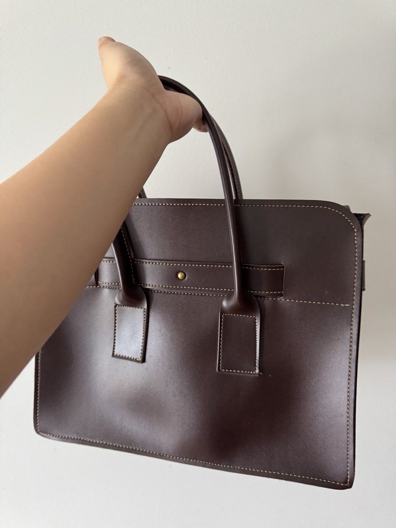 Authentic leather work bag from Thailand (Category: Tote Bags) located in Caloocan City. Submitted by alyyssssa (Listing ID 1463145600, Image 2). Description: Brown leather work bag from thailand Rfs: decided to use a backpack instead for work. .