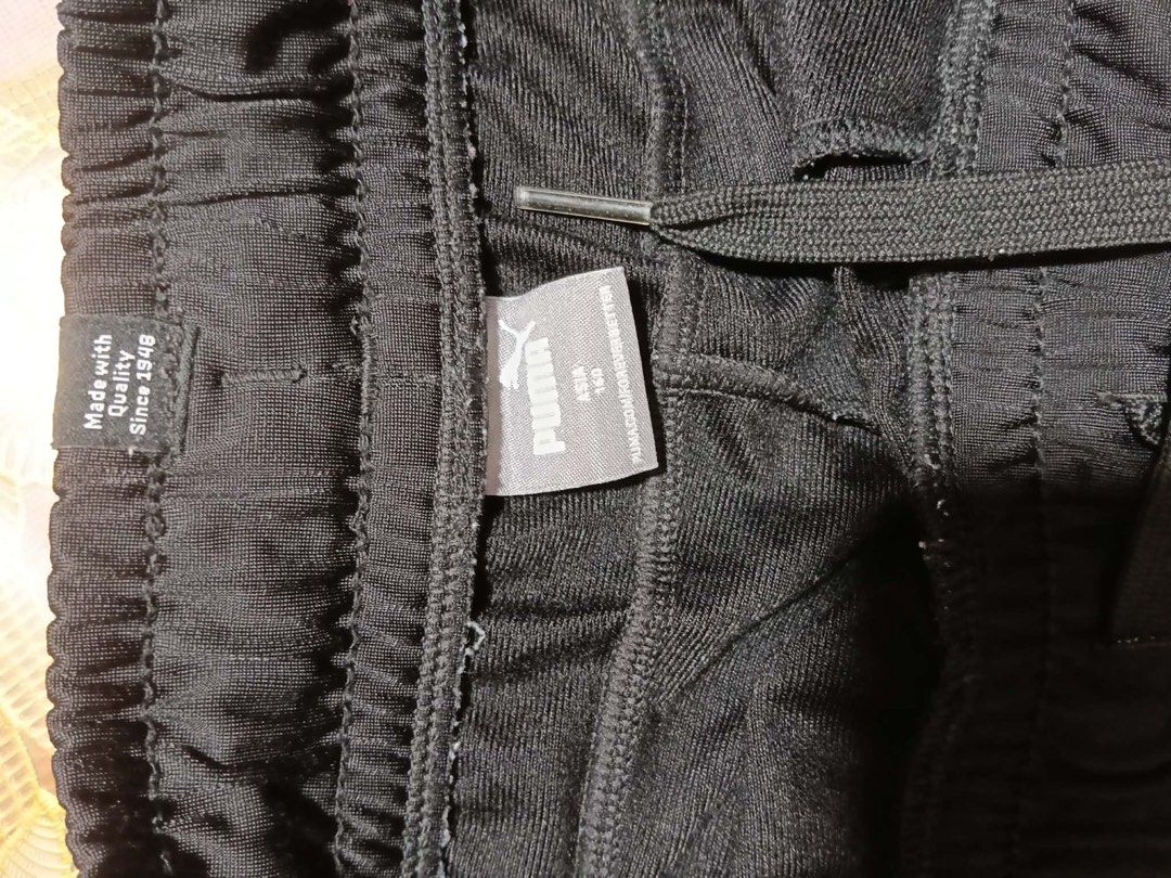 Authentic Puma Dark Blue Jogger Pants (Category: Joggers) located in Manila. Submitted by practicalitynerd (Listing ID 1463226037, Image 3). Description: - Authentic Puma jogger pants - Color: Dark Blue - Waist (unstretched): Approx. 13 inches across - Total Length: Approx. 35 inches - Leg Cuff: Approx. 7 inches across - Ideal for casual wear or workouts - Please check measurements before purchasing.