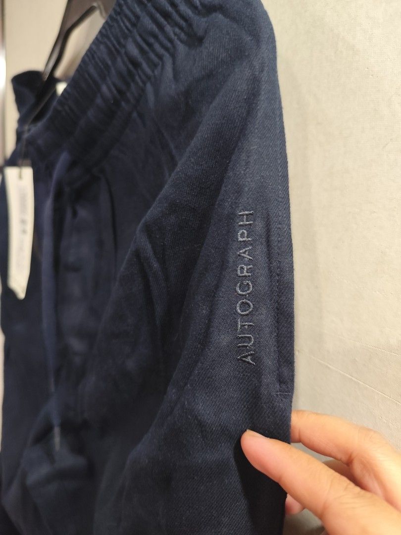 Autograph by M&S Navy Blue Drawstring Trousers Size S (Category: Other Bottoms) located in Manila. Submitted by jeduardo2194952 (Listing ID 1463291121, Image 2). Description: - Brand new with tags -Size Small to Medium - Navy blue trousers from Autograph - Elasticated waistband with drawstring - Straight leg fit - Subtle 'Autograph' embroidery on left leg - Perfect for casual wear.