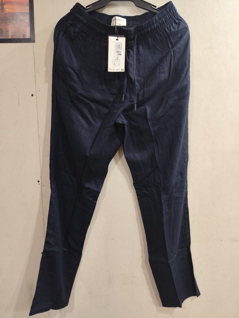 Autograph by M&S Navy Blue Drawstring Trousers Size S (Category: Other Bottoms) located in Manila. Submitted by jeduardo2194952 (Listing ID 1463291121, Image 3). Description: - Brand new with tags -Size Small to Medium - Navy blue trousers from Autograph - Elasticated waistband with drawstring - Straight leg fit - Subtle 'Autograph' embroidery on left leg - Perfect for casual wear.