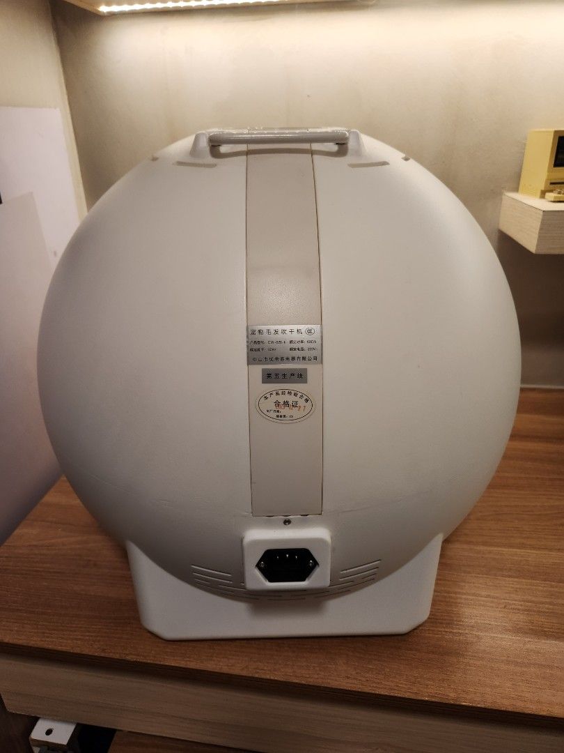 Automatic Pet Dryer (Category: Homes & Other Pet Accessories) located in Caloocan City. Submitted by noblestorm_c6463a (Listing ID 1463264945, Image 3). Description: - White spherical pet dryer - Clear dome on the front for visibility - Vents on the sides for airflow - Convenient top handle for easy carrying - Sturdy and durable construction pm if interested.