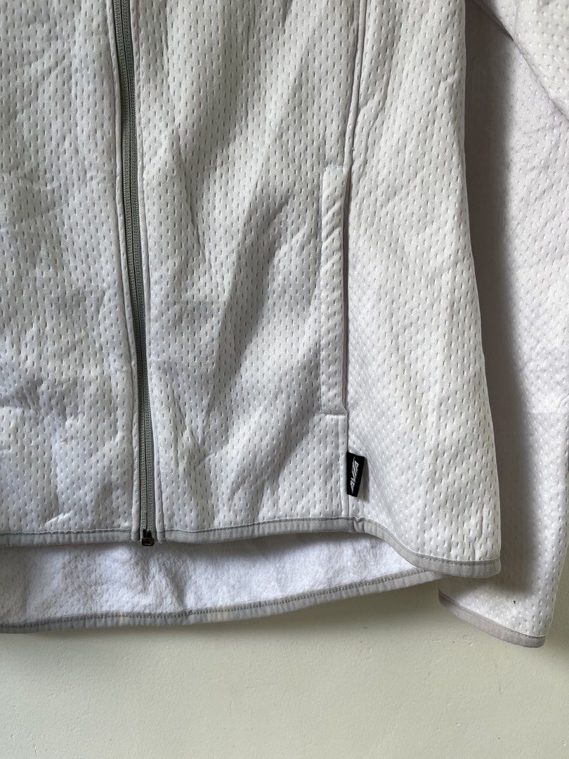 Avia White Textured Zip-Up Hoodie (Category: Hoodies) located in Santa Rosa. Submitted by thrifty_bev (Listing ID 1463225231, Image 3). Description: - White Avia hoodie - Textured pattern - Full zip-up front with hood - Two convenient front pockets - Ideal for workouts or casual wear - Comfortable and breathable material - Easy to layer.