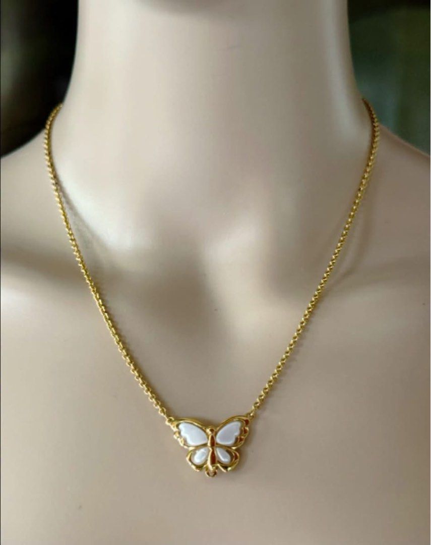 Avon Japan Necklace (Category: Necklaces) located in Quezon City. Submitted by liezl.marie (Listing ID 1463165000, Image 1). Description: A vintage Av0n Flight of Spring butterfly necklace featuring a gold-tone chain and a pearlescent white butterfly pendant. 2,500 Open for layaway..