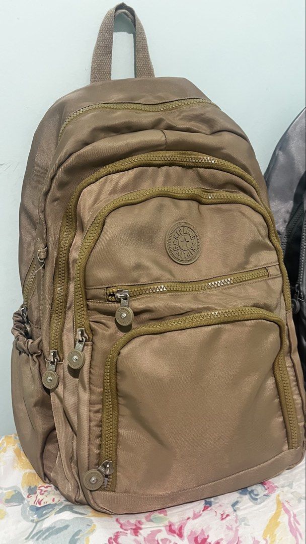 B1T1 KIPLING Bag/Backpack (Category: Backpacks) located in Lucena. Submitted by needfundsforojt (Listing ID 1463226254, Image 2). Description: (Personal Preloved) BUY 1 TAKE 1 Kipling Backpack - Brown and Grey Color - Womanhandled/ Pre-owned by woman means handled with care - For self-authentication ₱700 each Flaw: Pinhole flaw/Minimal inks NO COD / PAYMENT FIRST! ☺️ MOP: Gcash/Landbank/Gotyme Bank.