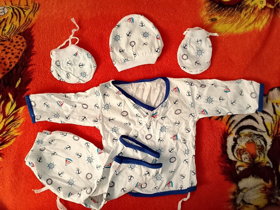 Baby Clothes Set - 4 Pieces - Various Prints (Category: Babies & Kids Fashion) located in Manila. Submitted by mari_123.123 (Listing ID 1463196480, Image 2). Description: - Set of 4 baby clothes for newborns - Each set includes: long-sleeved top, pants, hat, and mittens - Adorable prints: dinosaurs, anchors, whales, and stars - Made from soft, comfortable cotton material - Easy tie closures for a secure fit.