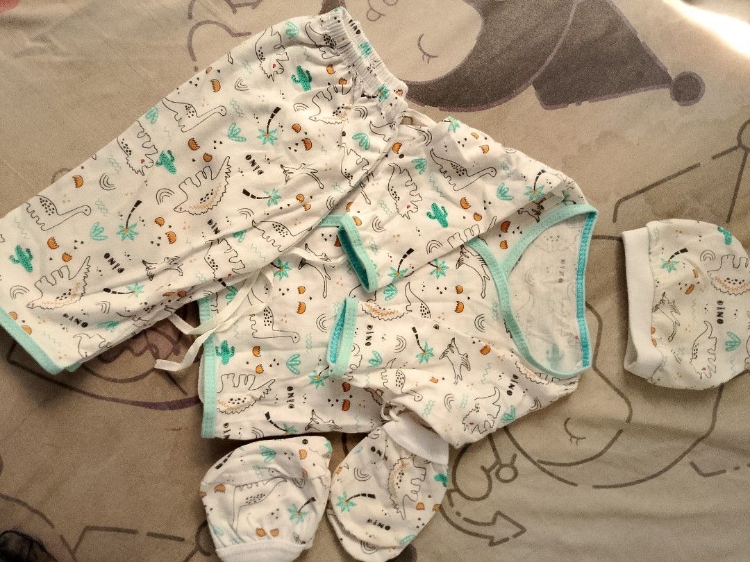 Baby Clothes Set - 4 Pieces - Various Prints (Category: Babies & Kids Fashion) located in Manila. Submitted by mari_123.123 (Listing ID 1463196480, Image 1). Description: - Set of 4 baby clothes for newborns - Each set includes: long-sleeved top, pants, hat, and mittens - Adorable prints: dinosaurs, anchors, whales, and stars - Made from soft, comfortable cotton material - Easy tie closures for a secure fit.