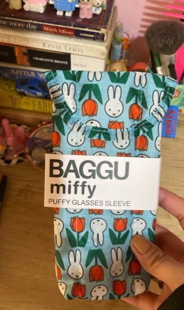 Baggu Miffy Puffy Glasses Pouch (Category: Sunglasses & Eyewear) located in Muntinlupa City. Submitted by irahfinds (Listing ID 1463167519, Image 1). Description: - Unsure about authenticity since this was a gift - Adorable Miffy bunny and tulip print - Puffy design for extra protection - Lightweight and easy to carry - Ideal for everyday use and travel - Stylish accessory to keep your glasses safe.