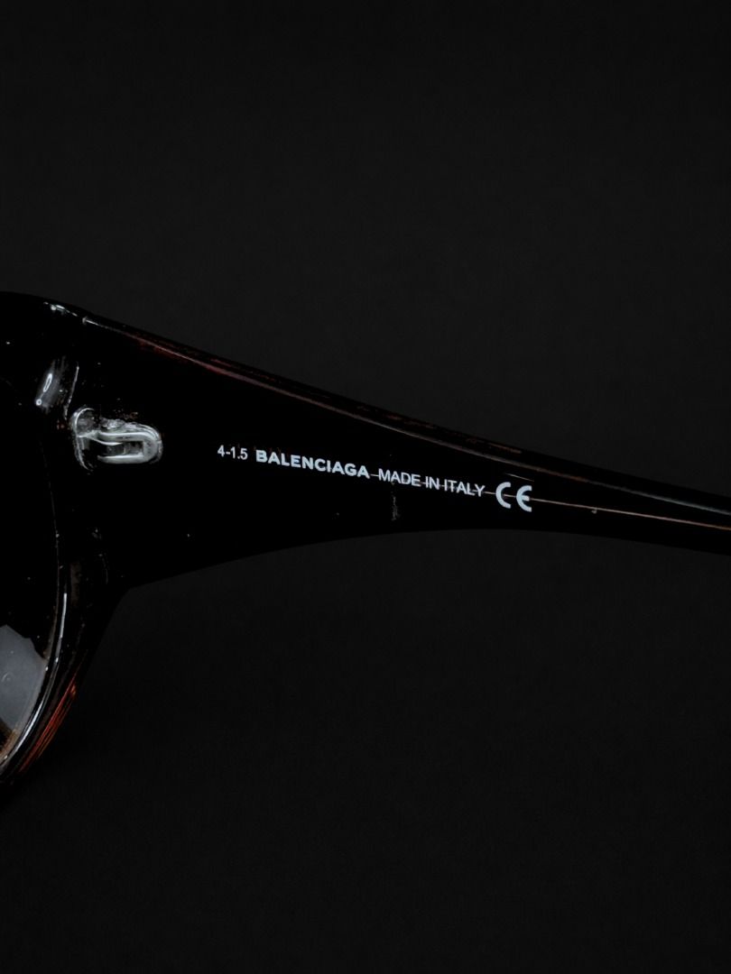 Balenciaga Sunglasses BA23 81B (Category: Luxury Accessories) located in Caloocan City. Submitted by grandbear.ee4db0 (Listing ID 1463204544, Image 3). Description: BALENCIAGA SUNGLASSES BA23 81B ₱7,000 | Negotiable Specifications: • Model: BA23 81B • Frame: Shiny Violet / Dark Acetate • Lens: Violet-Smoke Gradient • Size: 58–16–140 • Lens Height: 48 mm • Style: Oversized / Fashion Sunglasses • Made in Italy Inclusions: Balenciaga Pouch / Case & 