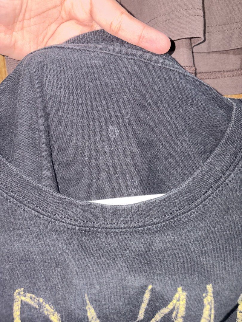 [BAND TEE] Nirvana Smiley Face T-Shirt (Category: Tshirts & Polo Shirts ) located in Imus. Submitted by frootiloots4103 (Listing ID 1463163509, Image 2). Description: - Authentic Nirvana smiley face t-shirt - Iconic graphic print with a faded, vintage look - Measurements: 23 inches wide x 30 inches long - Perfect for any Nirvana enthusiast.