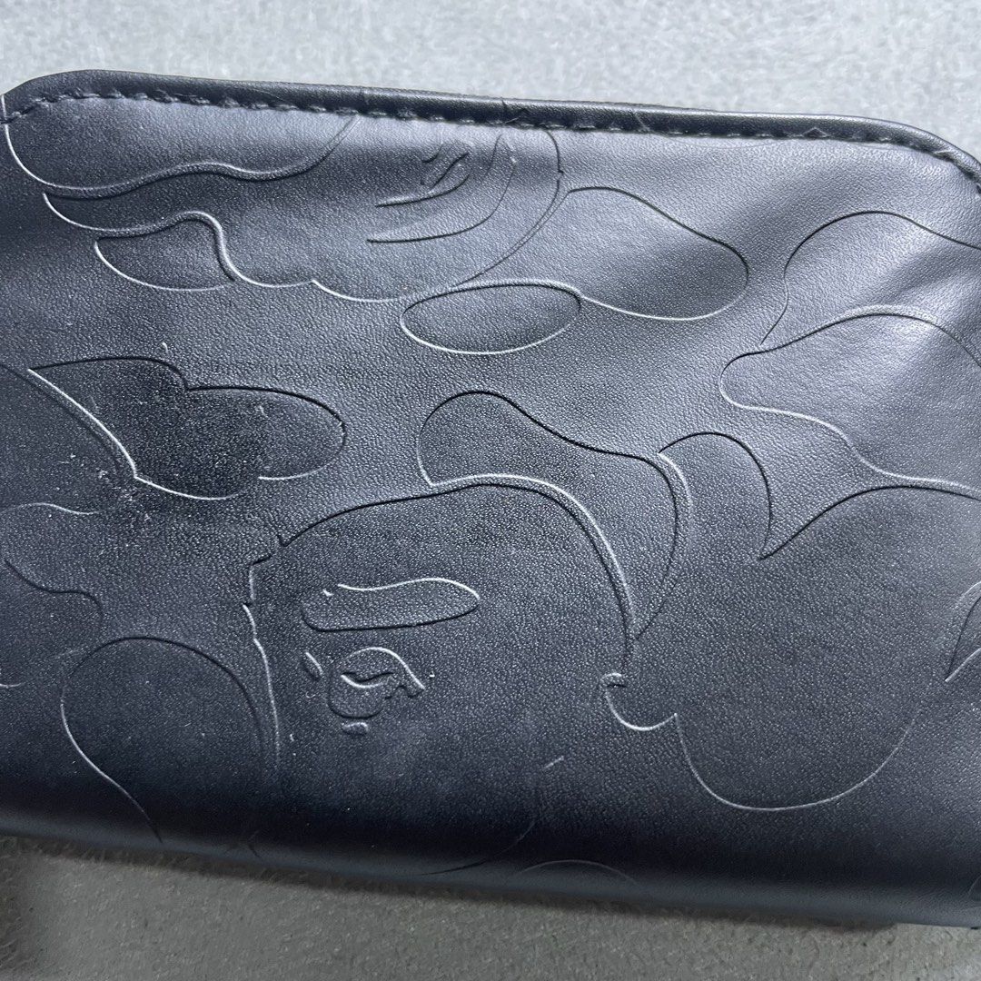 BAPE BLACK EMBOSSED CAMO COIN & KEY PURSE (Category: Wallets & Card Holders) located in Manila. Submitted by revise.ph_ (Listing ID 1463231309, Image 2). Description: BAPE BLACK EMBOSSED CAMO COIN & KEY PURSE Made in Height/Length:3.2 Width:4.7 Side Width:1.3 Issue: Price: 1,000 Free Shipping Via Jnt.