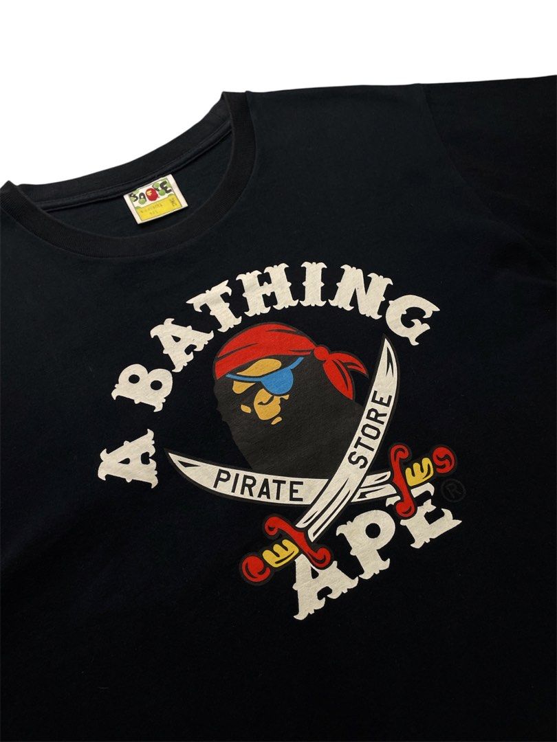 BAPE PIRATE COLLEGE TEE (Category: Tshirts & Polo Shirts ) located in Cabanatuan. Submitted by rmsdnl (Listing ID 1463235165, Image 2). Description: BAPE PIRATE COLLEGE TEE -Complete tags -Authentic Size m on tag best fit large Width-21 Length-27 Excellent condition Issue:Very tiny dot chip but the print is still intact Color rate:9.7/10 Price:2099.