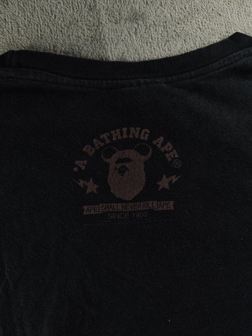 Bape x Bear Brick Camou Black Tee (Category: Tshirts & Polo Shirts ) located in San Pedro. Submitted by chronothrift2ndacc (Listing ID 1463183174, Image 3). Description: - Size: XL (W23 x 29L) - Condition: 8/10 - Color Rate: 8/10 - Flaws: Hairline Cracks / Fade MOD: J&T Express / Lalamove / Meetups MOP: Gcash / Bank Transfer.