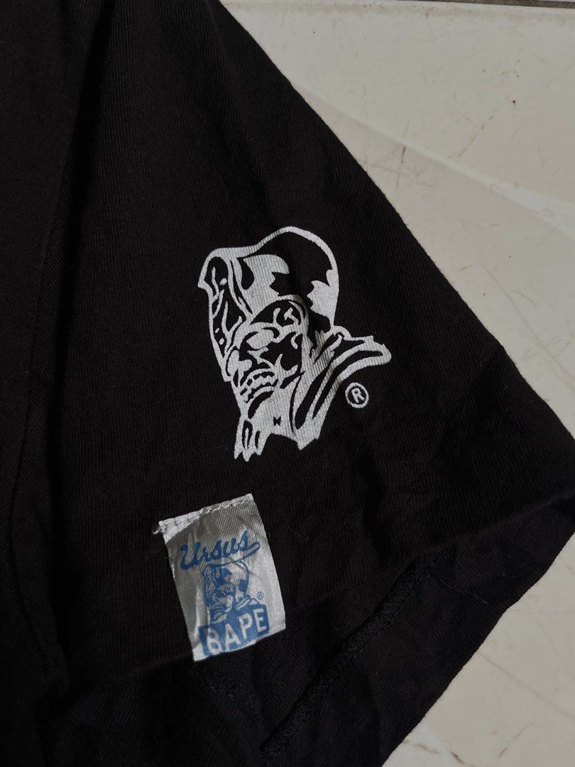 BAPE x Ursus T-Shirt Black (Category: Tshirts & Polo Shirts ) located in Legazpi City. Submitted by lobasmarka55195 (Listing ID 1463289440, Image 2). Description: - Black BAPE x Ursus T-shirt - Features the signature Ursus graphic on the sleeve - Simple and clean design - Ideal for casual wear - Must-have for BAPE collectors.