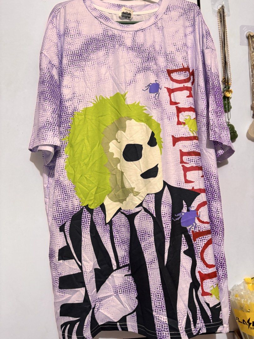 Beetlejuice Graphic T-Shirt (Category: Tshirts & Polo Shirts ) located in Bacoor. Submitted by dangeusebio1515 (Listing ID 1463325542, Image 1). Description: - Beetlejuice graphic t-shirt - All-over pattern design - Short sleeves - Crew neck - SHEIN collaboration - Ideal for Beetlejuice movie fans.