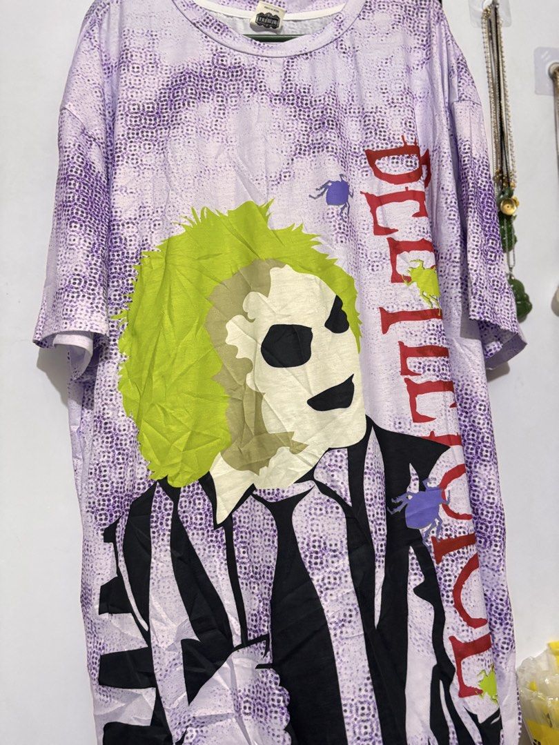 Beetlejuice Graphic T-Shirt (Category: Tshirts & Polo Shirts ) located in Bacoor. Submitted by dangeusebio1515 (Listing ID 1463325542, Image 3). Description: - Beetlejuice graphic t-shirt - All-over pattern design - Short sleeves - Crew neck - SHEIN collaboration - Ideal for Beetlejuice movie fans.