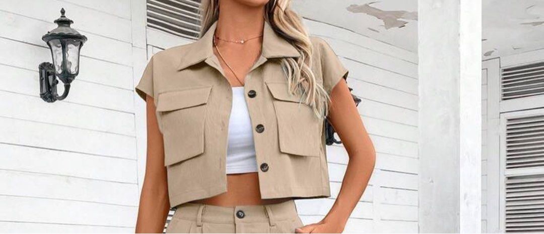 Beige Cropped Utility Top with Pockets (Category: Coats, Jackets and Outerwear) located in Las Pinas. Submitted by dhen.declutters (Listing ID 1463258010, Image 1). Description: - Cute beige cropped top - Short sleeves - Collared neckline - Two front pockets with button closures - Versatile for casual wear or layering - Pairs well with high-waisted bottoms.