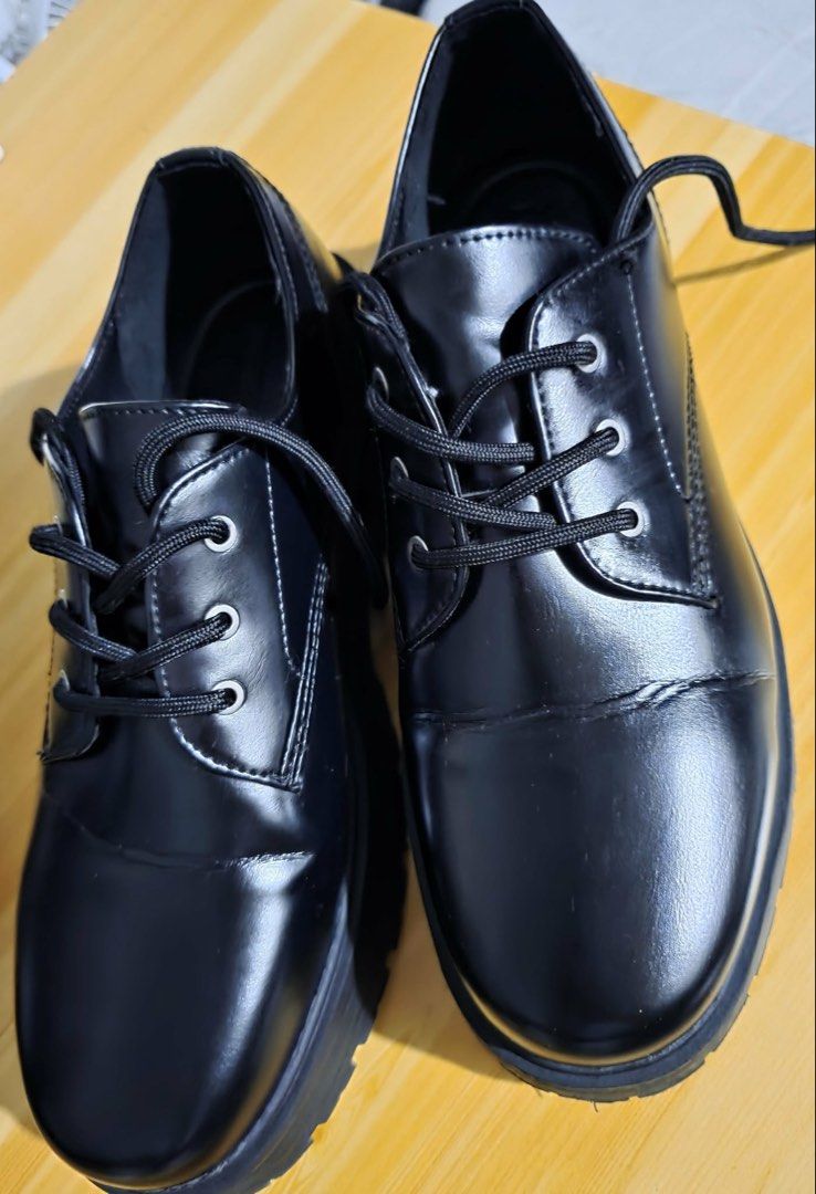 Bershka Black Chunky Platform Oxfords (Category: Casual Shoes) located in Manila. Submitted by newturtle-11626e (Listing ID 1463144691, Image 1). Description: - Brand: Bershka - Style: Chunky platform oxfords - Color: Black - Closure: Lace-up - Sole: Thick platform sole - Features: Adds height, edgy style - Versatile: Pairs well with jeans and dresses - Condition: Please check photos for details.