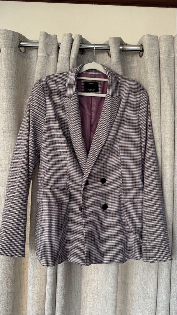 Bershka Double Breasted Plaid Blazer Purple (Category: Coats, Jackets and Outerwear) located in Manila. Submitted by patc20 (Listing ID 1463179718, Image 2). Description: - Size L - Bershka double-breasted blazer - Classic plaid pattern (purple, white, black) - Fully lined with contrasting purple fabric - Two-button front closure - Button details on cuffs - Versatile for smart casual looks.