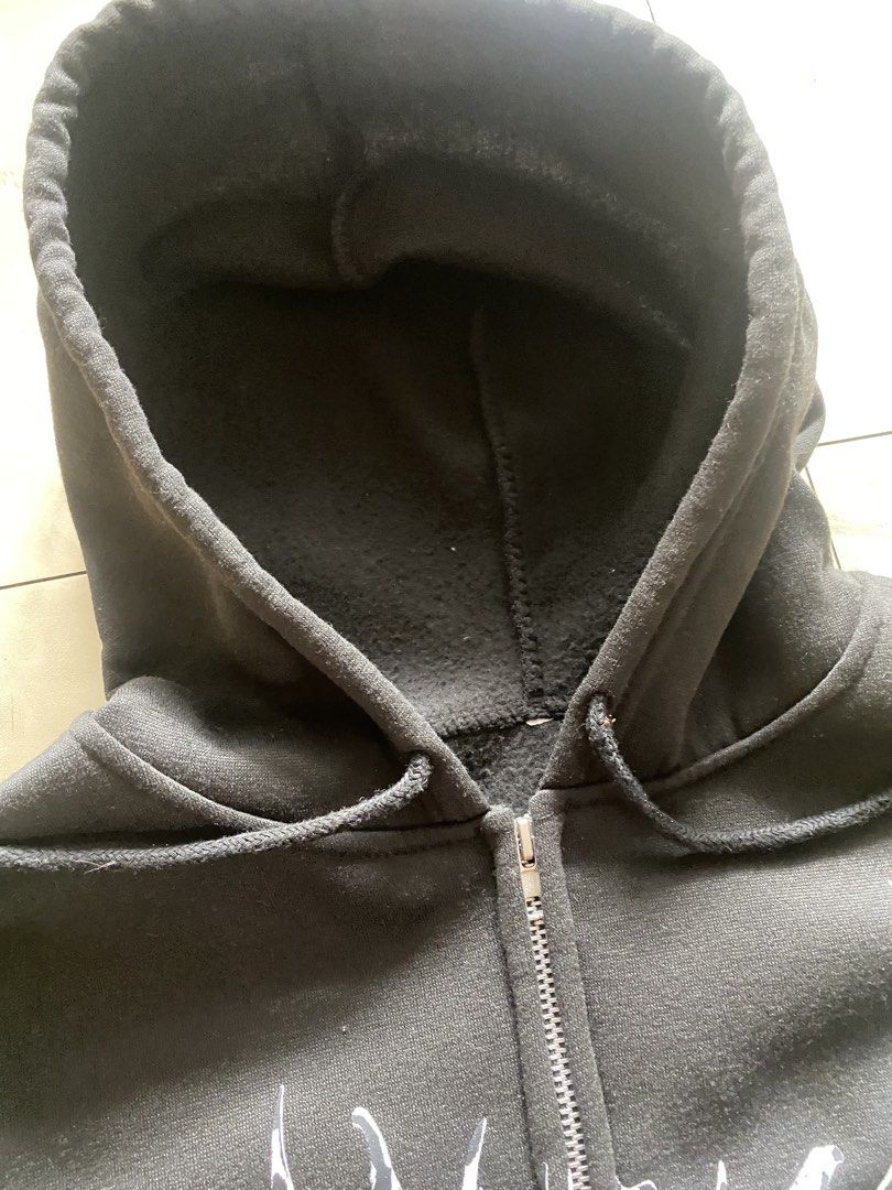 Black Butterfly Zip-Up Hoodie (Category: Coats, Jackets and Outerwear) located in Cabuyao City. Submitted by kekjct (Listing ID 1463240987, Image 3). Description: (Slightly Nego for Sure Buyers) Condition: 10/10 Size: 21” Pit-to-Pit × 25” Length (Regular / Slim Fit) Color: Washed Black / Charcoal Details: • Cybersigilism / tribal graphic print across chest • Full-zip front closure with silver metal zipper • Double front kangaroo pockets • Ribbed 