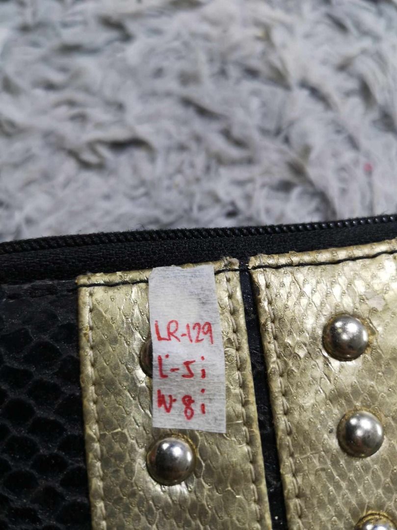 Black Faux Python Embossed Zipper Closure Wallet (Category: Wallets & Card holders) located in Santa Cruz. Submitted by jmy_surplus.2 (Listing ID 1463126160, Image 2). Description: Size ; L - 5 W - 8 Color ; Black Type ; Wallet Brand ; No brand Material ; Leather Style ; Exotic leather Zipper Closure Wallet LR 129 JMY 4 Batch #223.