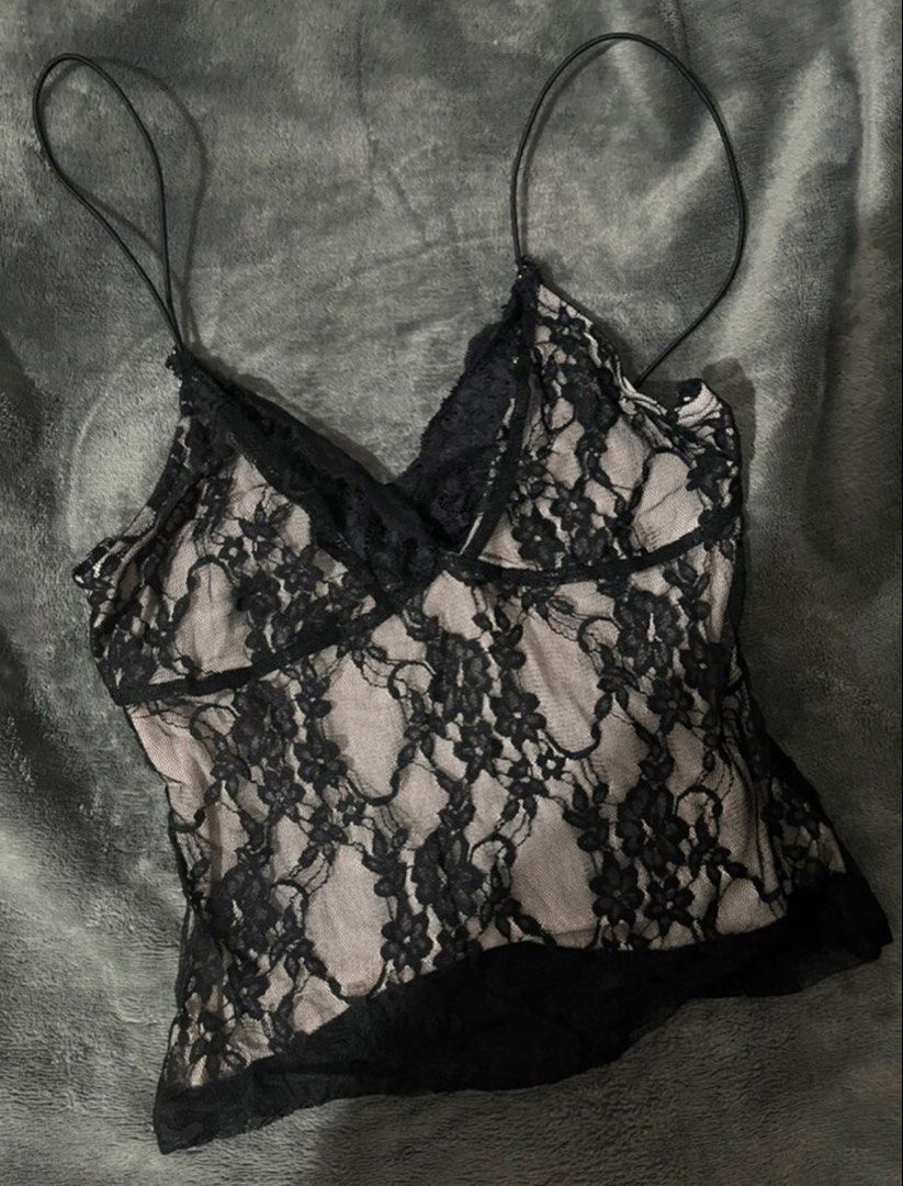 Black Lace Sheer V-Neck Cami Top | Perfect for Halloween party!! (Category: Sleeveless) located in Manila. Submitted by karinaaaaaaa2000 (Listing ID 1463277936, Image 1). Description: - Sheer black lace camisole - Nude lining for coverage - Delicate spaghetti straps - Scalloped V-neckline - Intricate and beautiful lace pattern - Perfect for layering or wearing on its own - Ideal for a night out or special occasion - Flattering fit loc: marikina m