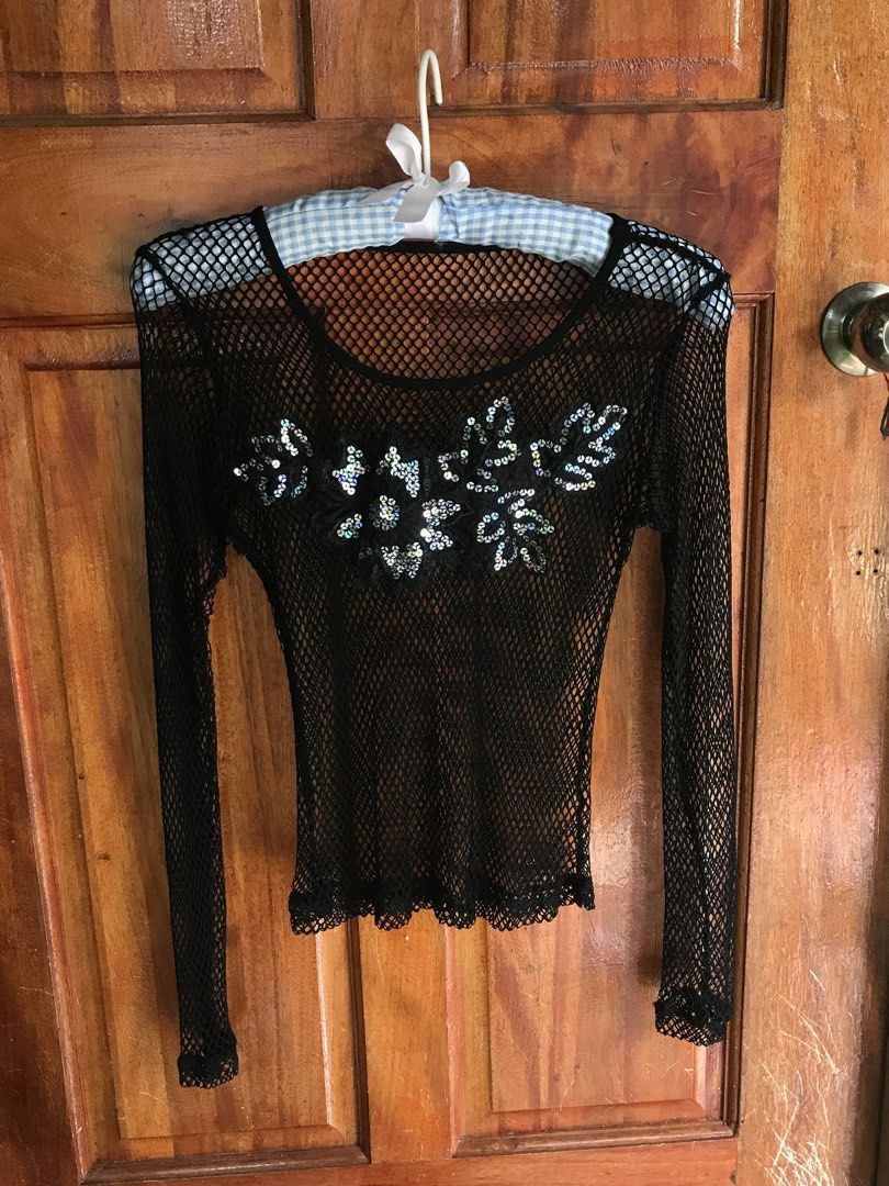 Black Mesh Long Sleeve Top with Sequins (Category: Longsleeves) located in Manila. Submitted by strawberrieaudr3y (Listing ID 1463276021, Image 1). Description: - Black fishnet long sleeve top - Floral applique with sequins on chest - Scalloped lace trim at hem and cuffs - Very stretchy material - Ideal for layering or a night out - Looks great over a bralette or camisole.