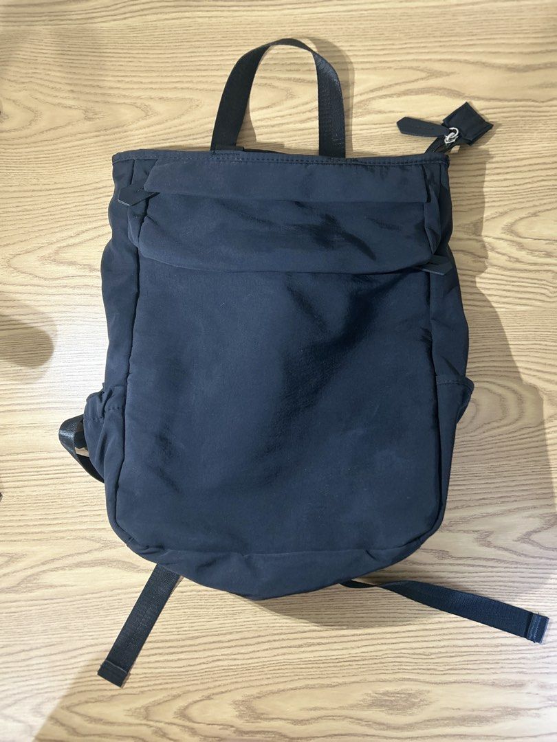Black Nylon Backpack with Multiple Pockets (Category: Backpacks) located in Manila. Submitted by zealpenguin-a0aa (Listing ID 1463119183, Image 1). Description: - Durable black nylon backpack - Comfortable top handles and adjustable shoulder straps - Secure main compartment with zip closure - Convenient front pocket with zip - Handy side pockets for extra storage - Ideal for everyday errands or travel adventures - Spacious interior to fit all you