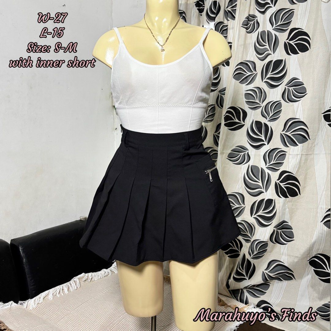 Black Pleated Mini Skirt with Inner Short (Category: Skirts) located in Mabalacat. Submitted by marahuyos.finds (Listing ID 1463232173, Image 1). Description: - Black pleated mini skirt - Inner shorts for comfort and coverage - Side zipper detail - Versatile for casual or night out - Fits size S-M (check measurements).