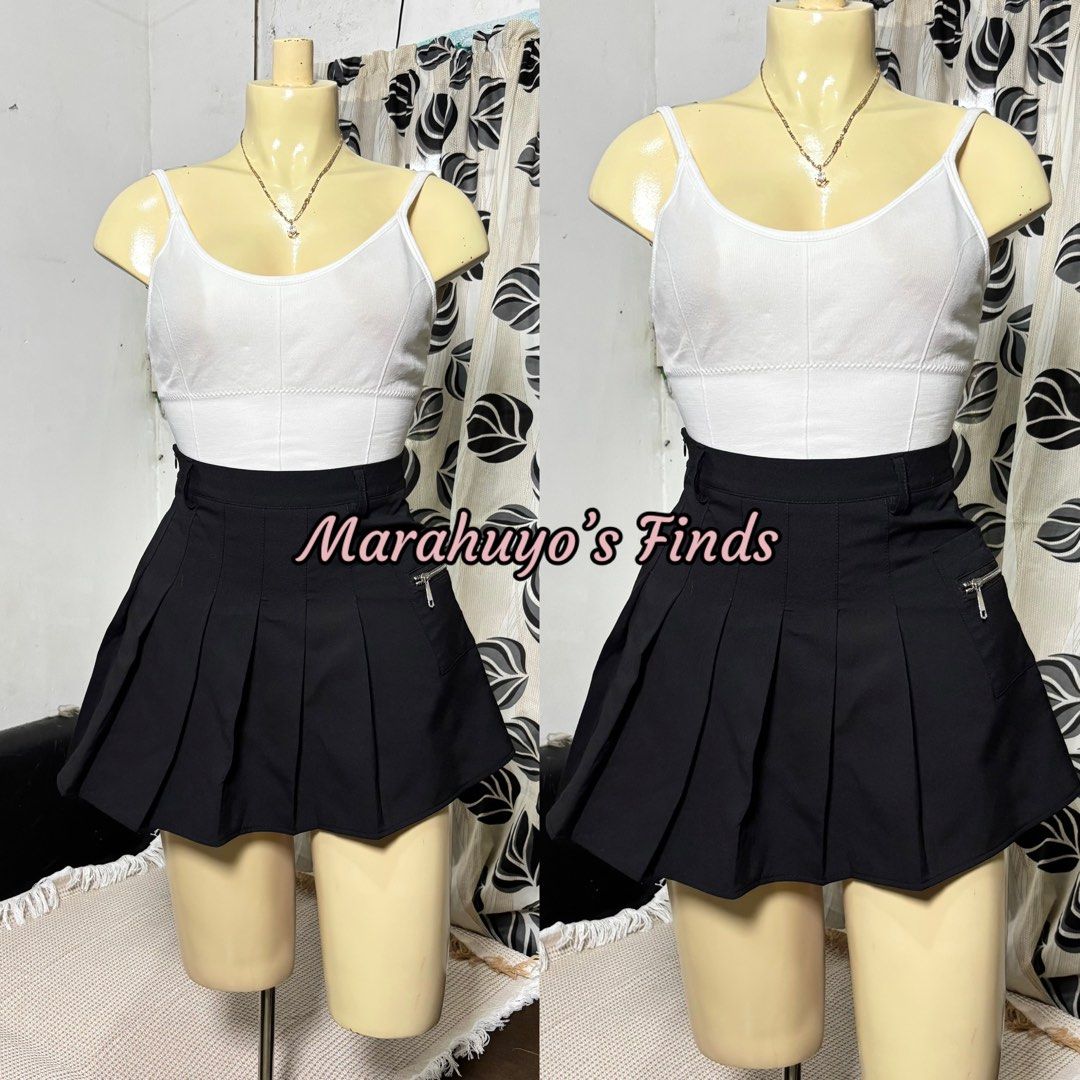 Black Pleated Mini Skirt with Inner Short (Category: Skirts) located in Mabalacat. Submitted by marahuyos.finds (Listing ID 1463232173, Image 2). Description: - Black pleated mini skirt - Inner shorts for comfort and coverage - Side zipper detail - Versatile for casual or night out - Fits size S-M (check measurements).
