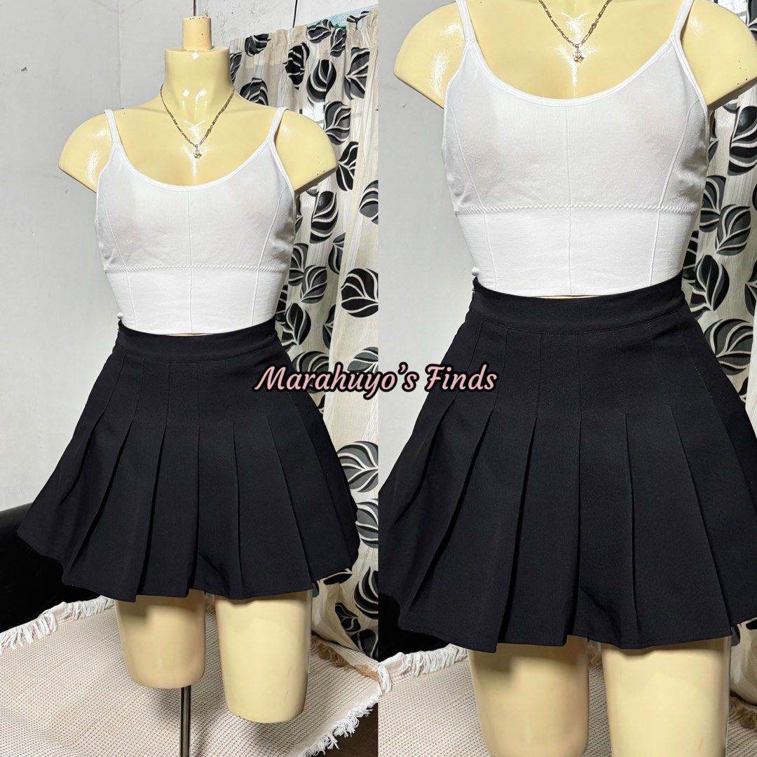 Black Pleated Mini Skirt with Inner Short Size S (Category: Skirts) located in Mabalacat. Submitted by marahuyos.finds (Listing ID 1463232195, Image 2). Description: - Black pleated mini skirt - Size S - Waist: 26-27 inches - Length: 15 inches - Built-in inner shorts for added coverage - Versatile for casual or dressed-up looks.