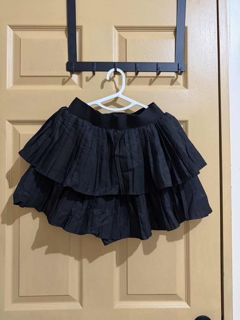 Black Pleated Tiered Mini Skirt (Category: Skirts) located in Manila. Submitted by chavirly (Listing ID 1463267906, Image 1). Description: - Black tiered pleated mini skirt - Comfortable elastic waistband - Fun and flirty style - Perfect for dressing up or down - Looks great with boots or sneakers.
