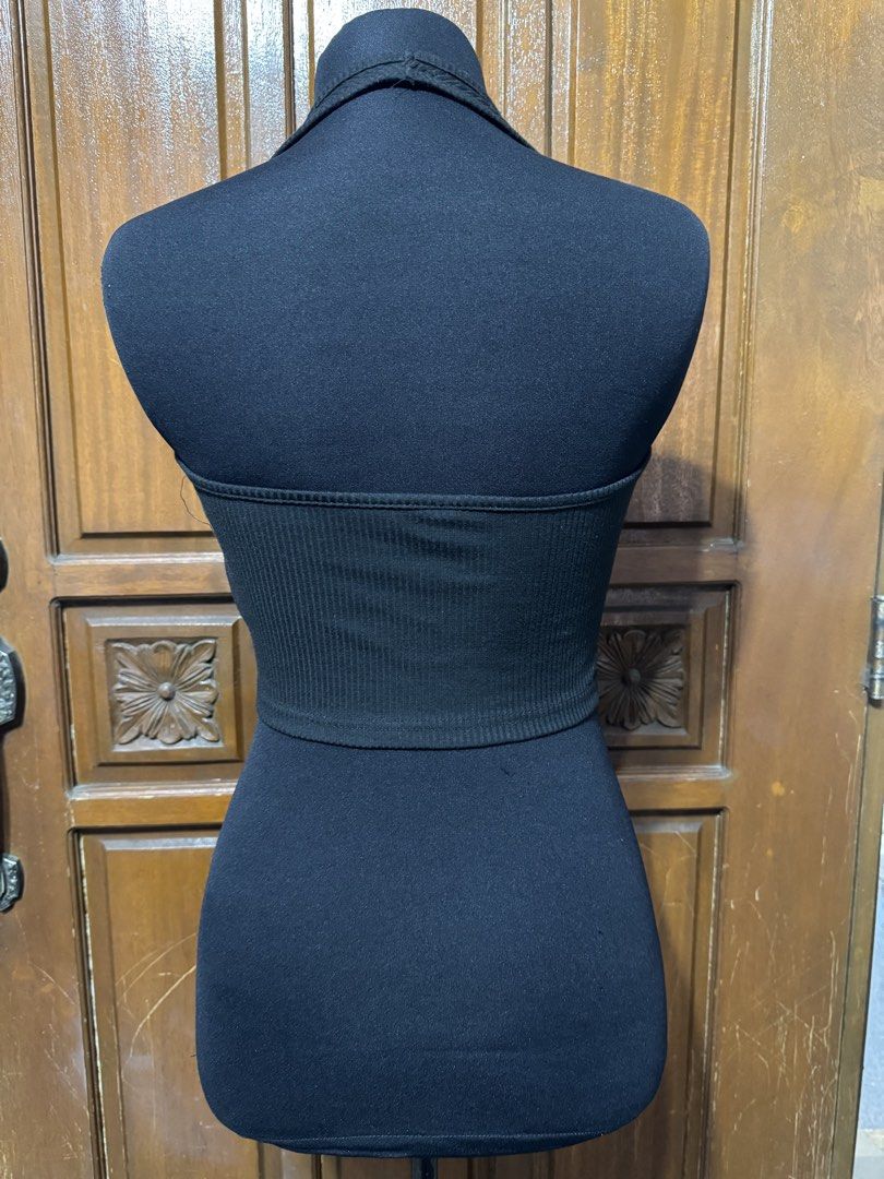 Black Ribbed Halter Neck Crop Top (Category: Sleeveless) located in Manila. Submitted by prelovedshopmnl (Listing ID 1463171340, Image 2). Description: - Black ribbed crop top - Halter neck with V-neckline - Stretchy material for comfort - Cropped length, hits at the waist - Versatile for layering or solo wear - Pairs easily with jeans or skirts.