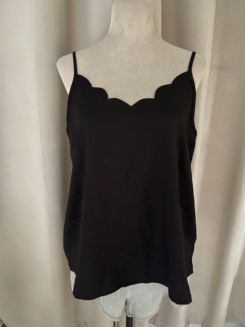 Black Scalloped Cami Top (Category: Sleeveless) located in Cainta. Submitted by zlove111 (Listing ID 1463175564, Image 1). Description: - Chic black camisole top - Features a cute scalloped neckline - Adjustable spaghetti straps for a perfect fit - Made from lightweight material that drapes beautifully - Ideal for layering or wearing solo - Effortlessly dress up or down for any event xl .