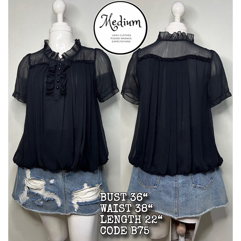 Black Sheer Ruffle Neck Short Sleeve Blouse (Category: Blouses) located in Taguig. Submitted by cftbncs (Listing ID 1463164263, Image 1). Description: - Cute black sheer blouse - Ruffle neck detail - Short sleeves - Button front closure - Measurements: Bust 36", Waist 38", Length 22" - Versatile for layering or wearing solo - Item Code: B75.
