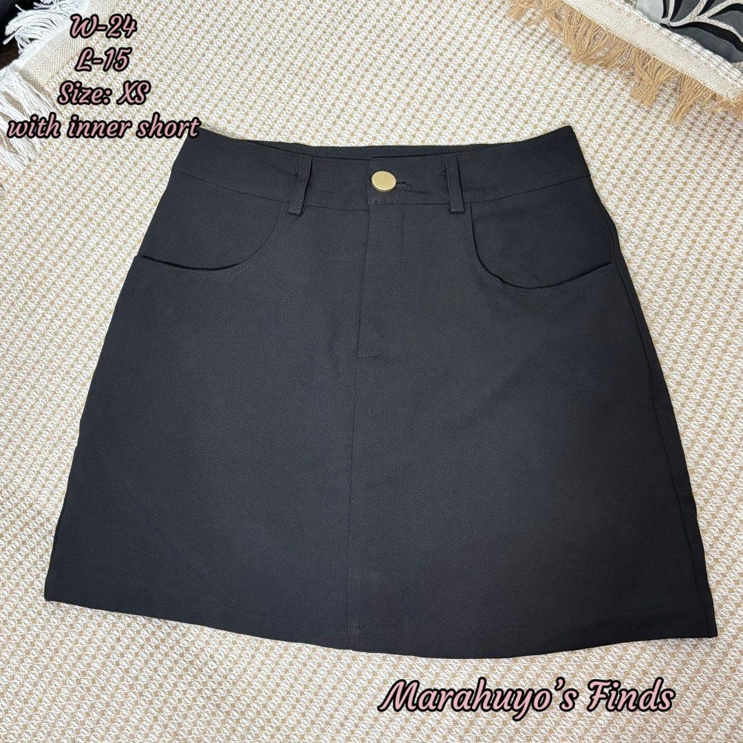 Black Skirt with Inner Short - Size XS (Category: Skirts) located in Mabalacat. Submitted by marahuyos.finds (Listing ID 1463231996, Image 1). Description: - Stylish black A-line skirt - Built-in inner shorts for added coverage - Two functional front pockets - Secure button and zip closure - Ideal for casual outings or dressing up - A versatile addition to any wardrobe.