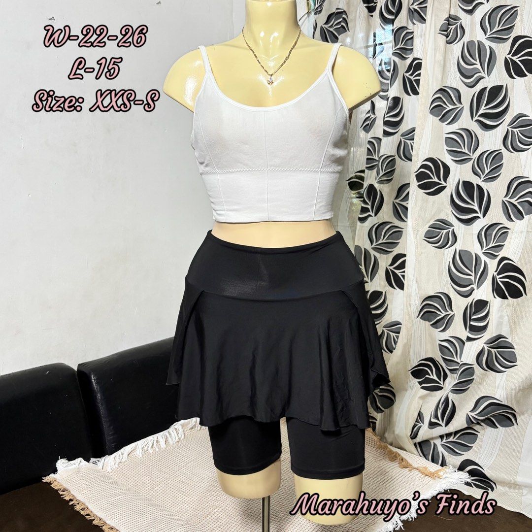 Black Skirt with Shorts Set (Category: Sets or Coordinates) located in Mabalacat. Submitted by marahuyos.finds (Listing ID 1463232328, Image 1). Description: - Cute black skirt with integrated shorts - Includes a white ribbed crop top - Versatile for casual wear or sports activities - Comfortable and stylish design - Size: XXS-S - Measurements: Waist 22-26 inches, Length 15 inches.