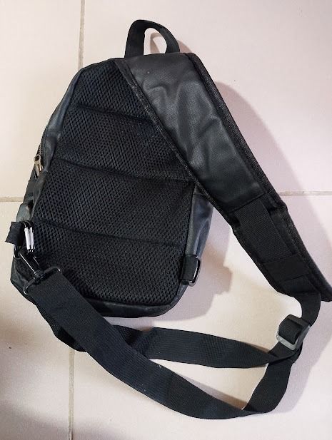 Black Sling Bag with Mesh Back (Category: Sling Bags) located in Quezon City. Submitted by susmaryosep1 (Listing ID 1463256821, Image 2). Description: - Stylish black sling bag - Padded mesh back for ultimate comfort - Adjustable strap for a perfect fit - Secure zipper closure - Ample space for all your daily essentials - Ideal for everyday use used 300 pesos.