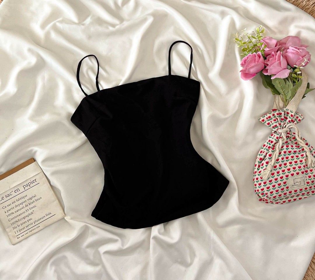 Black Spaghetti Strap Square Neck Top (Category: Sleeveless) located in Manila. Submitted by preloved_tweeds_ph (Listing ID 1463148408, Image 1). Description: small - medium - Simple black spaghetti strap top - Square neckline - Fitted silhouette - Versatile for layering or wearing alone - Perfect for casual or dressy outfits.