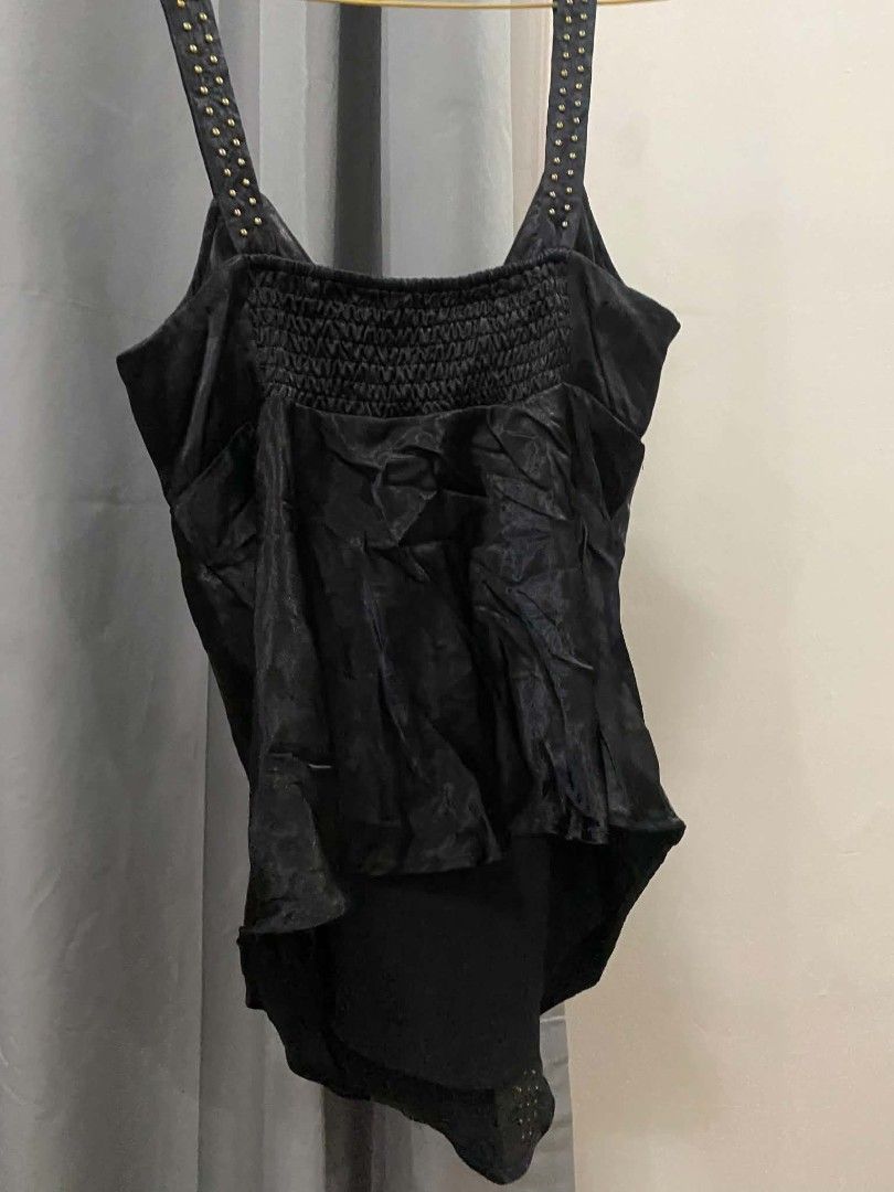 Black Studded Smocked Bodysuit Tank Top (Category: Sleeveless) located in Malasiqui. Submitted by finnley26 (Listing ID 1463165764, Image 2). Description: - Shiny black fabric - Smocked chest detail - Tank top style - Straps with gold stud accents - Versatile for layering or wearing alone SMALL TO MED.