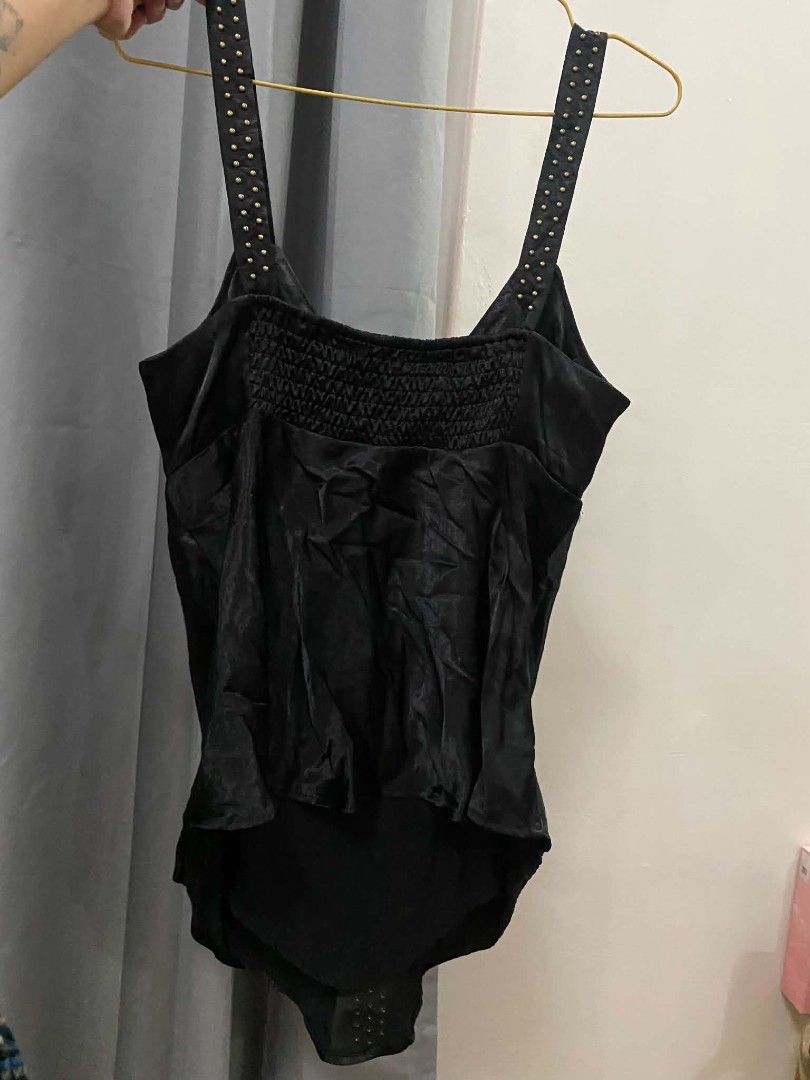 Black Studded Smocked Bodysuit Tank Top (Category: Sleeveless) located in Malasiqui. Submitted by finnley26 (Listing ID 1463165764, Image 3). Description: - Shiny black fabric - Smocked chest detail - Tank top style - Straps with gold stud accents - Versatile for layering or wearing alone SMALL TO MED.