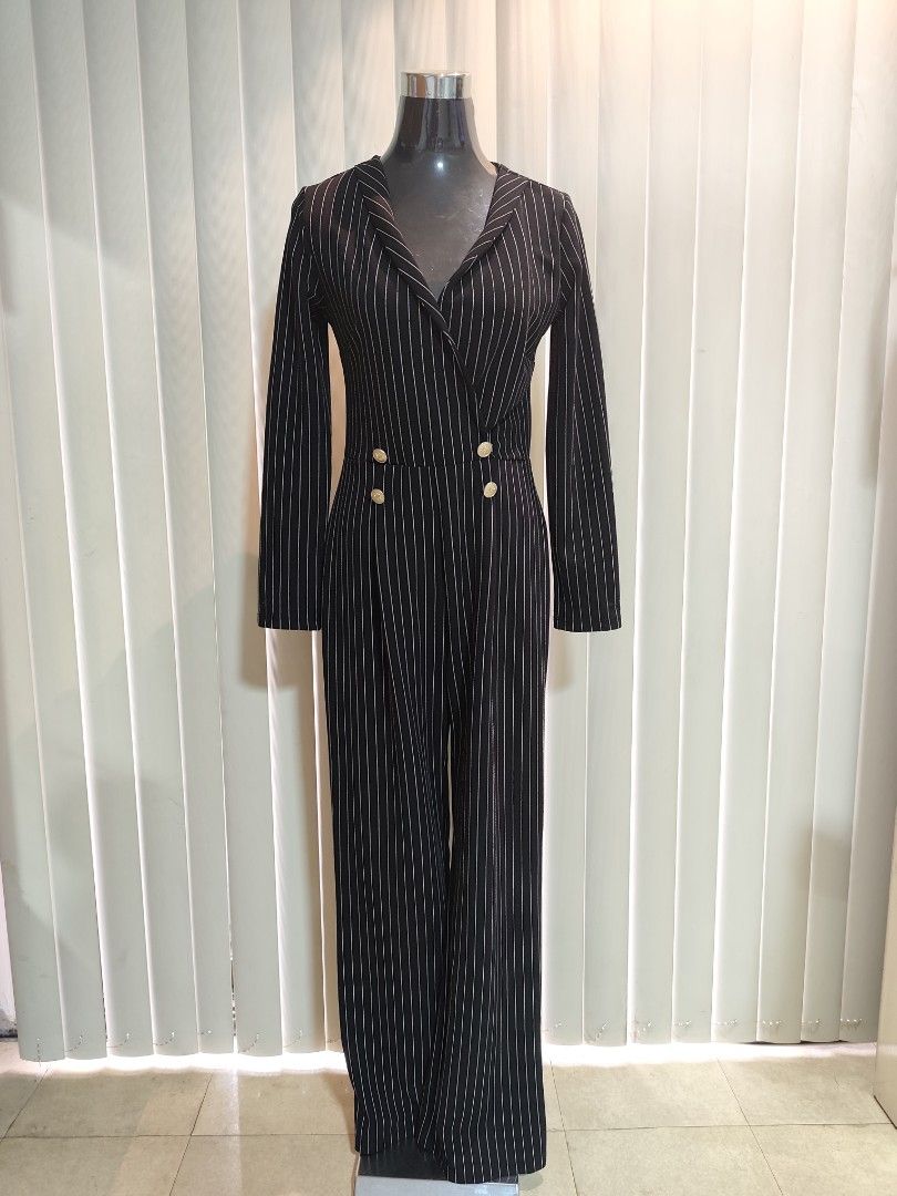 Black with white lines corporate jumpsuit (Category: Jumpsuits) located in Makati City. Submitted by khrizaccessories (Listing ID 1463167016, Image 3). Description: Bought in California USA Sleek corporate jumpsuit waist 30" to 34" stretch shoulder 14" length from waistline 43" sleeves 24".